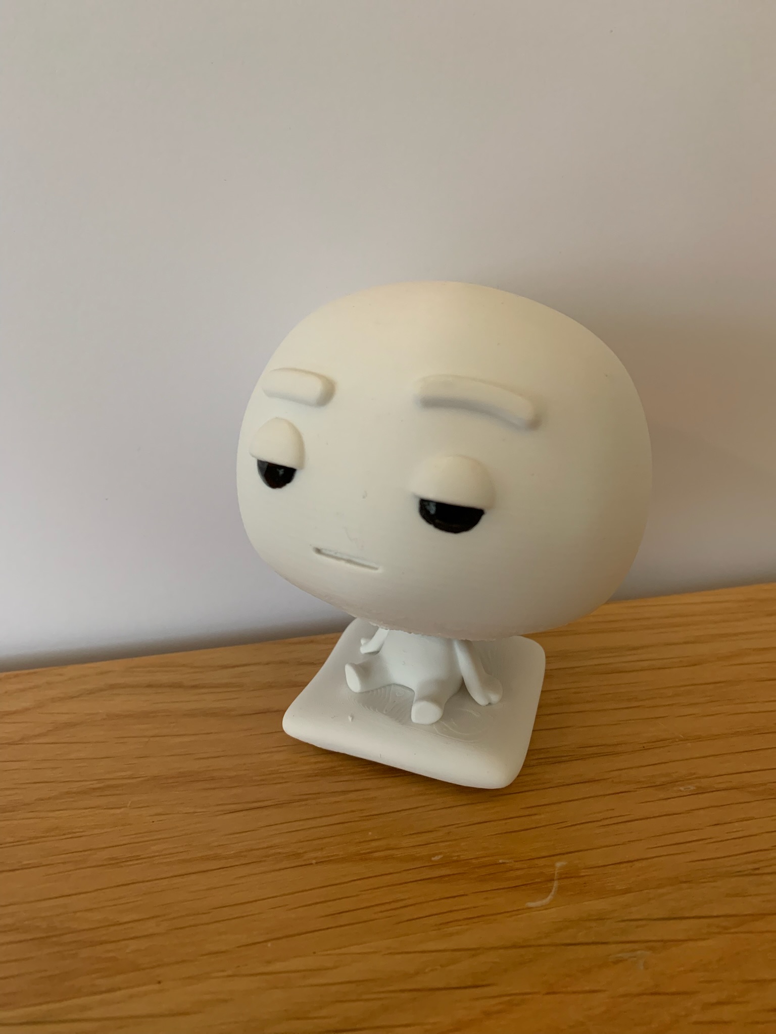 Pixl Nub on a wooden desk